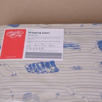 Halványszürke fóliázott húscsomagoló papír kék színű hús mintával - 60x40 cm / 15 kg